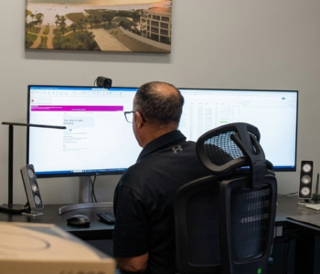 IT professional monitoring information on a computer workstation